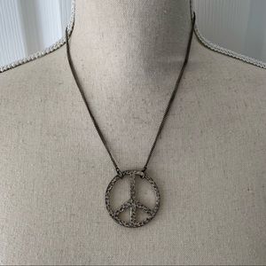Silver chain hammered peace sign necklace